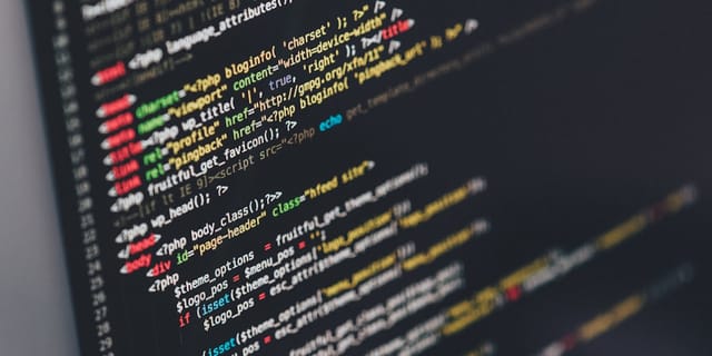 Close-up of source code with a security warning overlay on a terminal screen