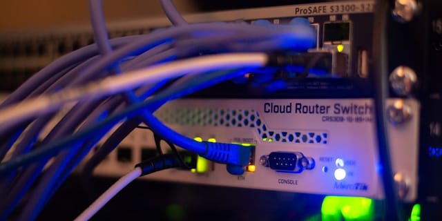 a close up of a network with wires connected to it